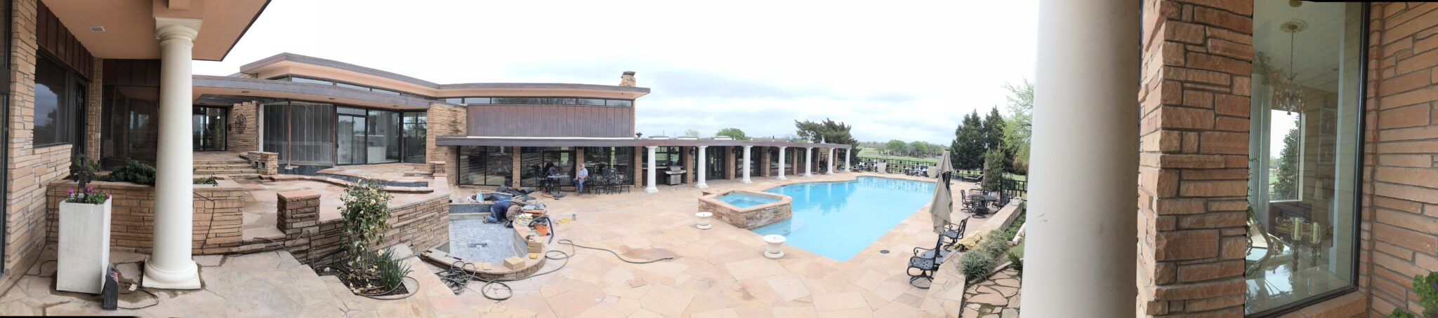 Using an iPhone, we took a great shot that shows the gorgeous length of this back yard. You can see the elevated decking (left) with our raised water features. This will host our LED Waterfalls & Fire Features to create a gorgeous scene at night. The pool (right) was already existing when we took on the job. 