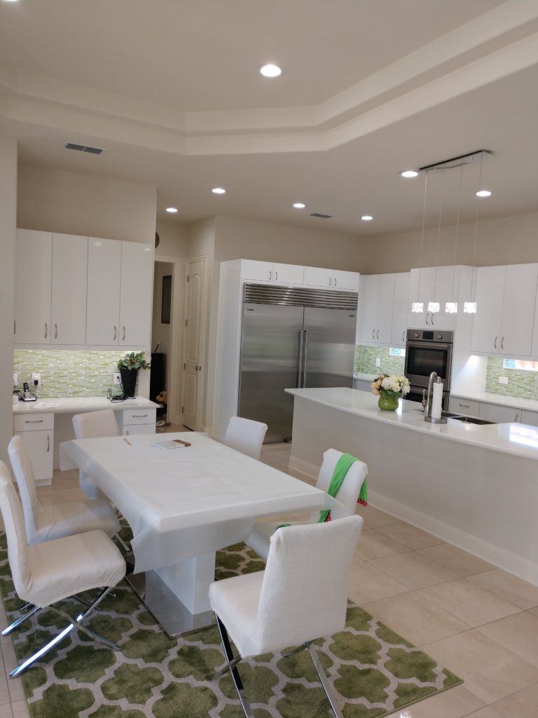 Now this is a kitchen that we could definitely cook up some lunch in! Believe us, it was tempting to fire up the oven and get some fajitas cooking for our crews. Kidding aside, we relied on our talented Elite Cabinetry Division to design the custom cabinets to suite our clients taste. That's some beautiful craftsmanship!